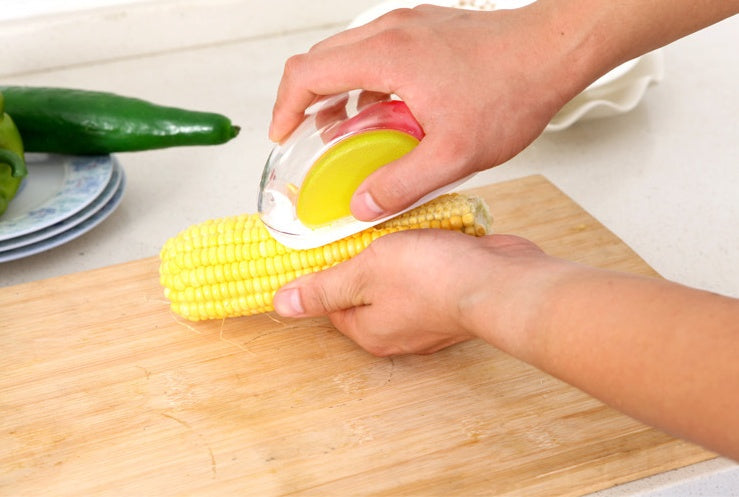 Corn peeler tool on cutting board